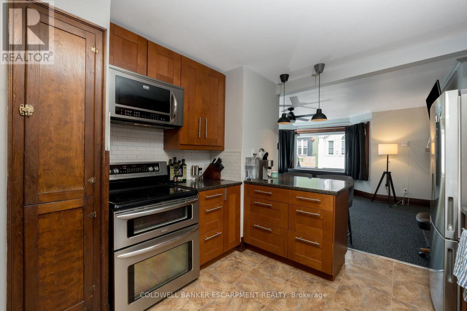 A - 20 Mill Street E, Halton Hills (Ac Acton), Ontario  L7J 1G9 - Photo 2 - W12926970