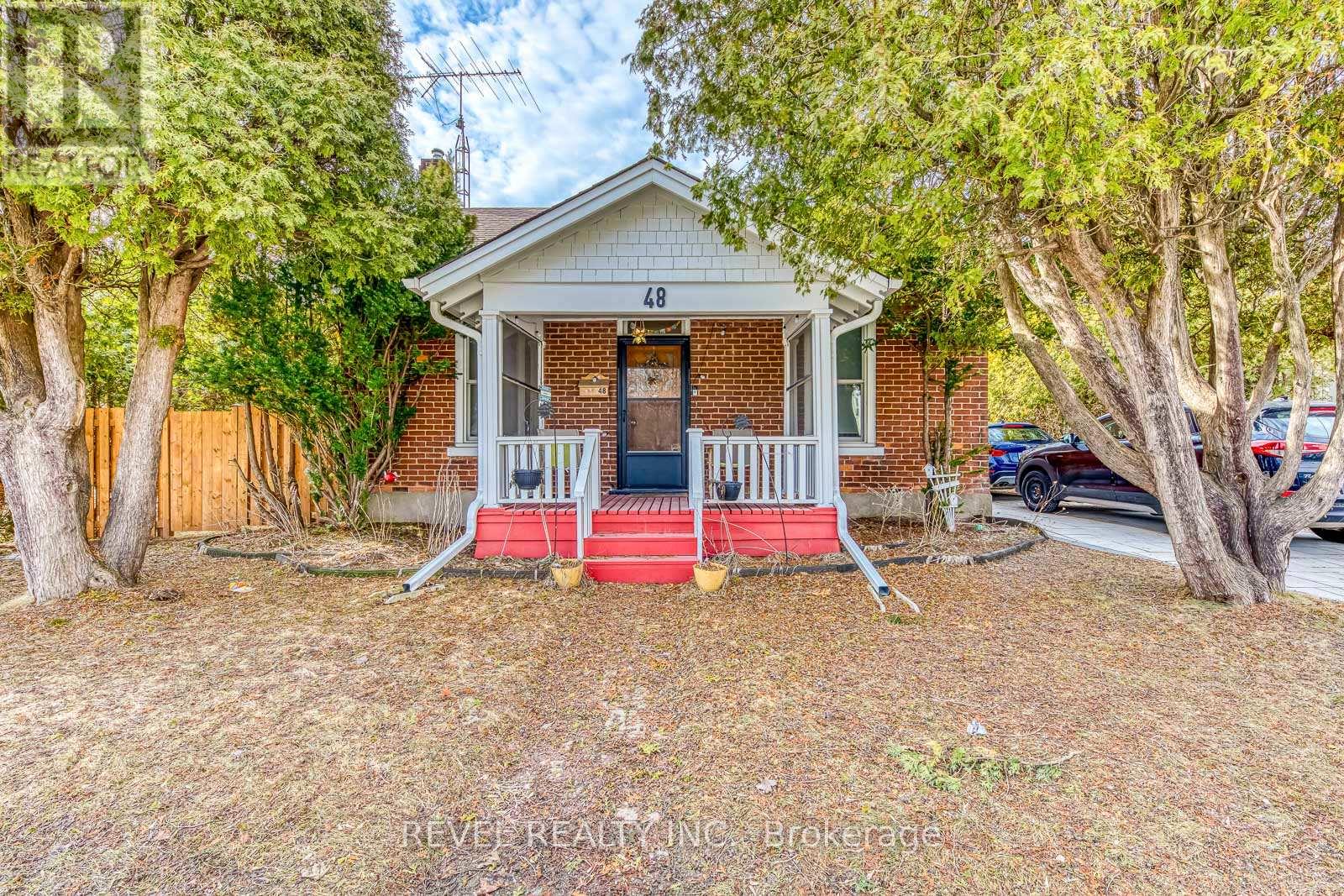 48 Young Street, Halton Hills (Ac Acton), Ontario  L7J 2G7 - Photo 1 - W12929508