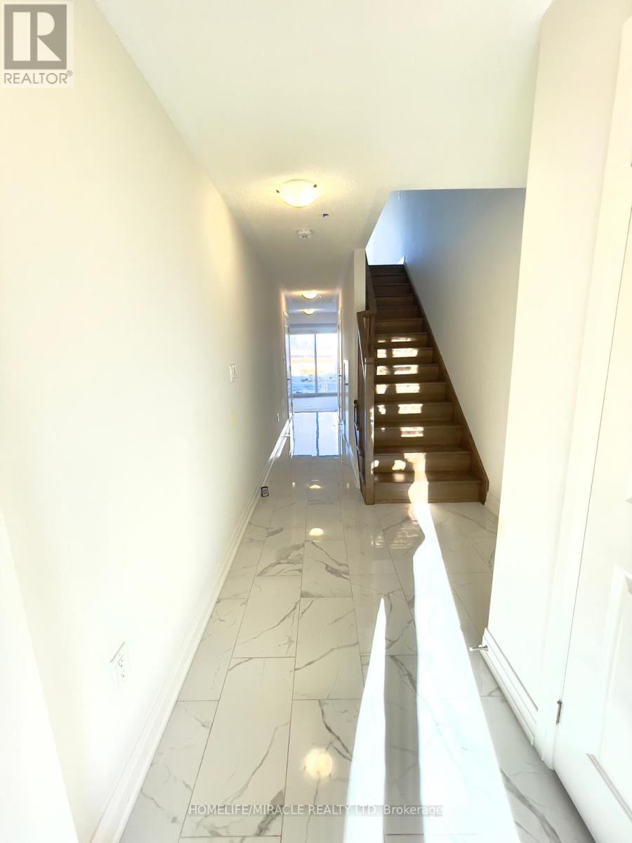 87 Windtree Way, Halton Hills (Georgetown), Ontario  L7G 0P6 - Photo 3 - W12989404