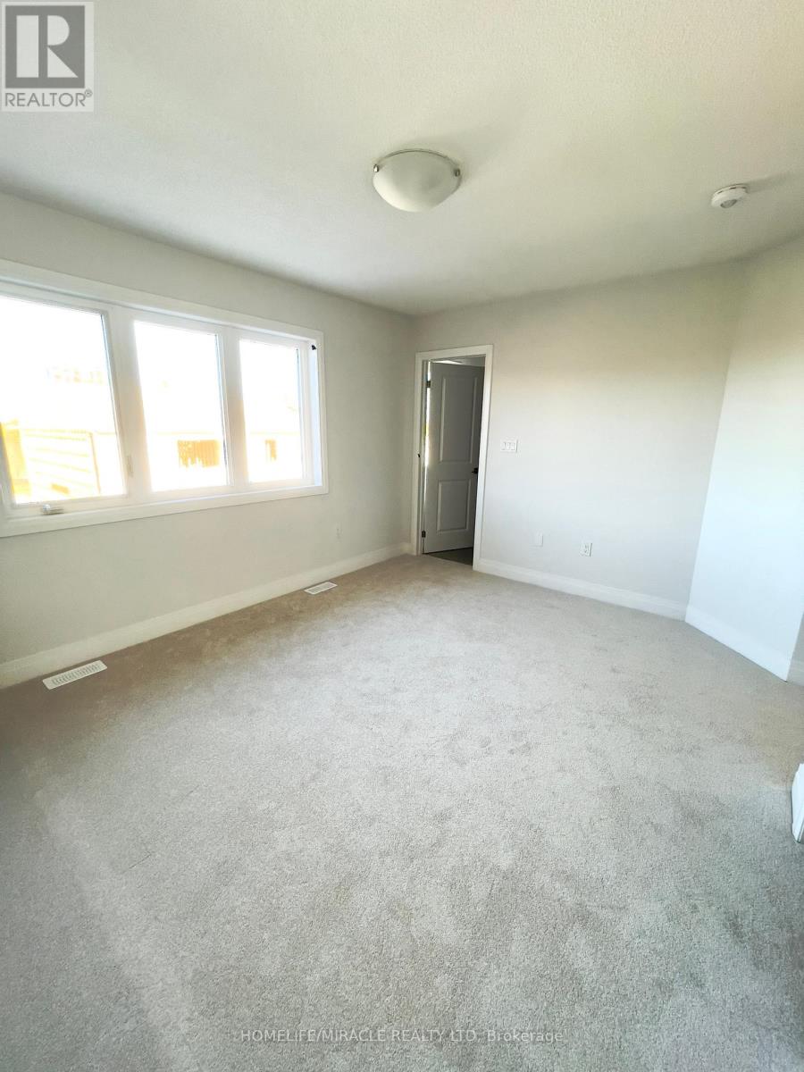 87 Windtree Way, Halton Hills (Georgetown), Ontario  L7G 0P6 - Photo 33 - W12989404