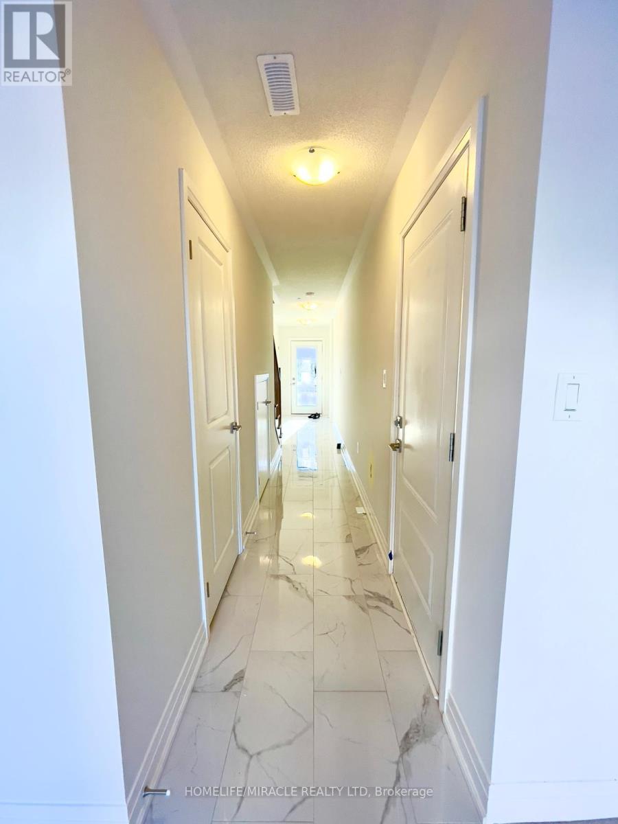 87 Windtree Way, Halton Hills (Georgetown), Ontario  L7G 0P6 - Photo 7 - W12989404