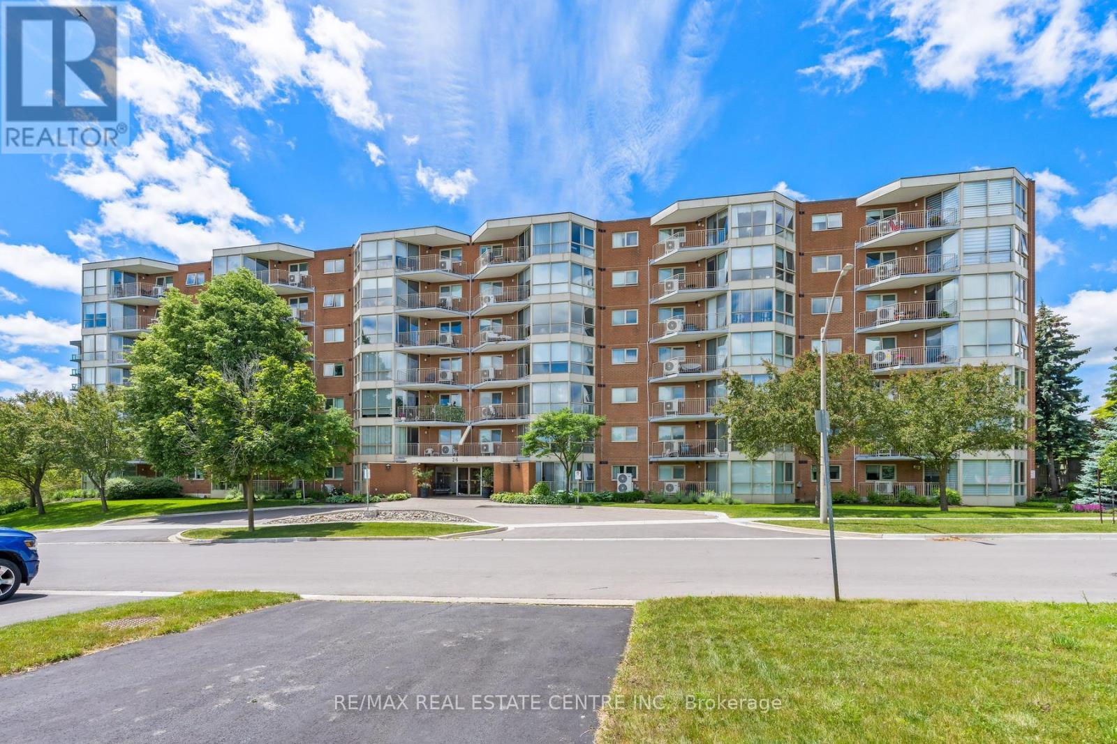 406 - 26 Hall Road, Halton Hills (Georgetown), Ontario  L7G 0J8 - Photo 1 - W13468934