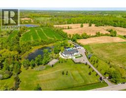 <div class="price">$5,649,000</div> 13311 Sixth Line Nassagaweya, Milton<br><div style="margin-bottom:8px;"><small>Keller Williams Edge Realty</small></div><div class='bed_bath'>6 Bed | 8 Bath</div>